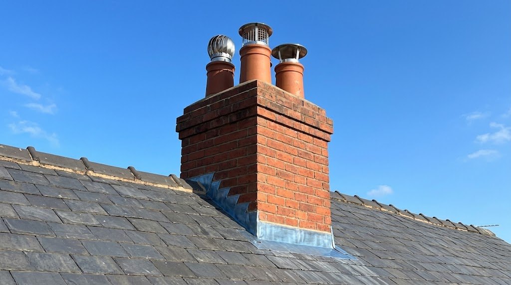 Photo of a chimney stack with new lead flashing
